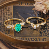 The Sumptuous Oval - Cut Emerald Halo Ring